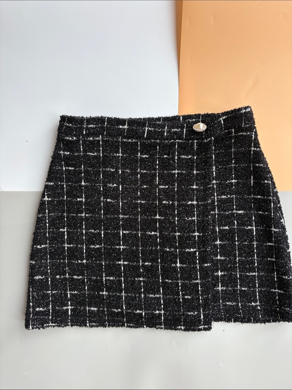 Sincerly Jules Black Tweed Mini Skirt with Windowpane Detail and Pearl Accent